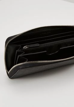 Michael Kors GREYSON TECH ZIP AROUND Portefeuille Black Unisex -Michael Kors Soldes Boutique 063ee0814b294e869bddd2243f8c8417