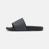 Michael Kors JAKE SLIDE Mules Greyhound/black Homme
