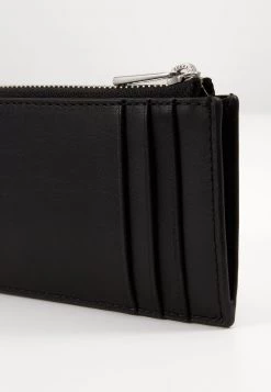 Michael Kors ZIP WALLET Portefeuille Black Unisex -Michael Kors Soldes Boutique e30a1f1af80a4f4b911135f6b4b93a1b